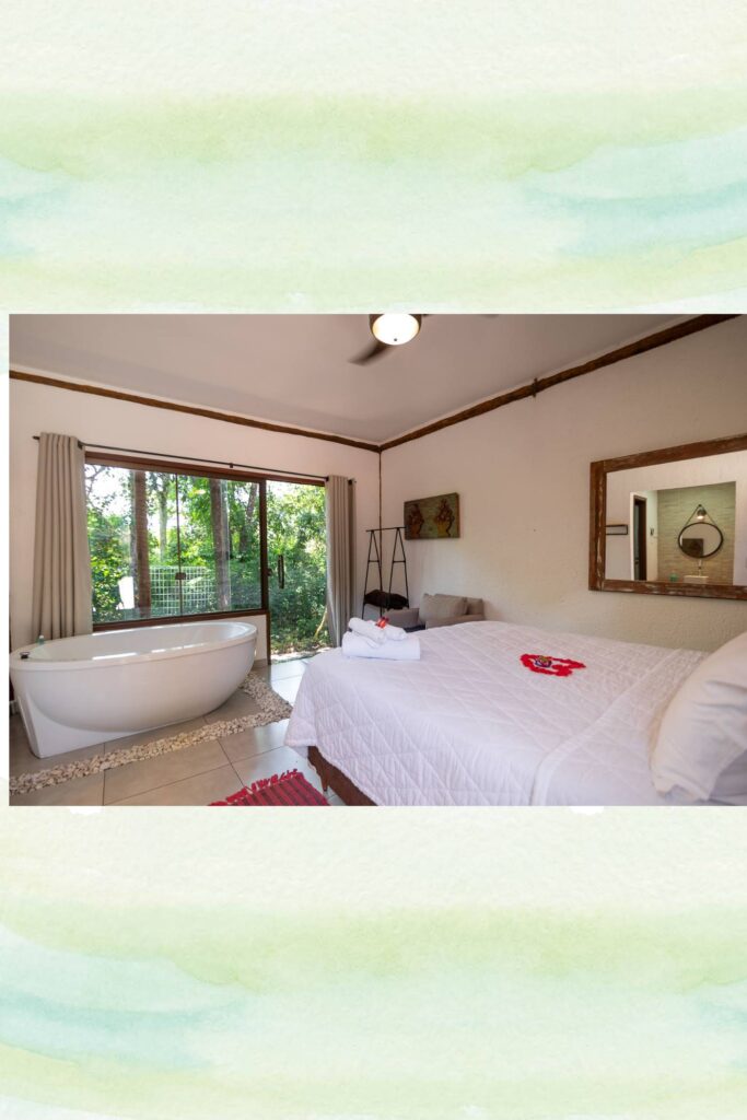 Quarto com banheira da Pousada A Mi Manera em Brumadinho