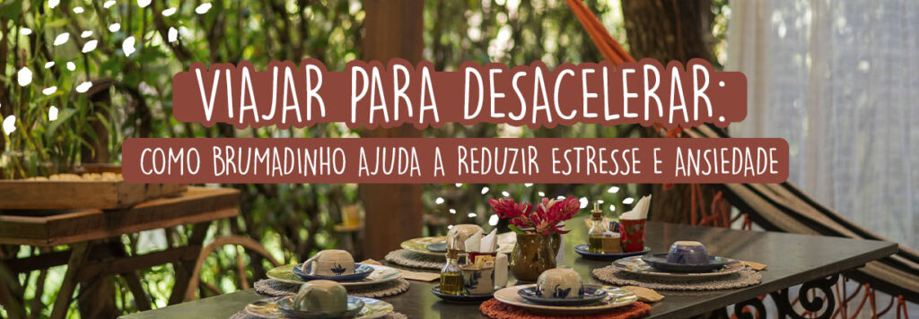 Viajar para desacelerar: como Brumadinho ajuda a reduzir estresse e ansiedade. Imagem de uma mesa posta com louças em porcelana, vaso com flores e temperos como azeite e sal.